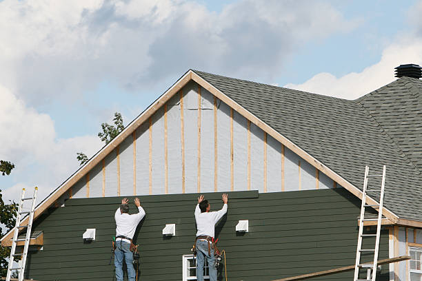 Professional Siding Installation technician working in Rising Sun, IN